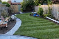 A long thin suburban garden of a '30s house, transformed