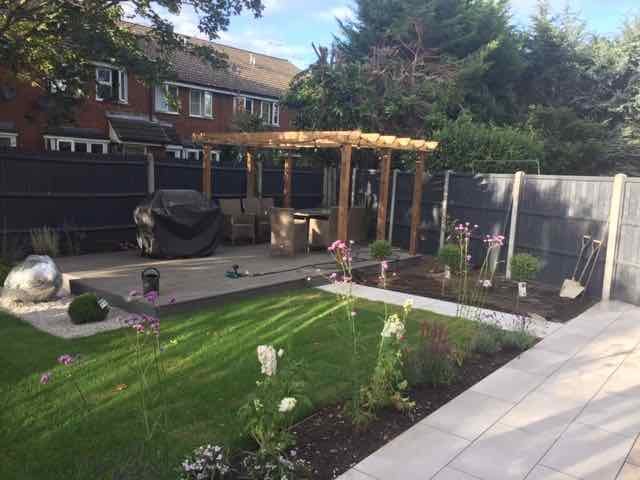 New garden with deck and pergola